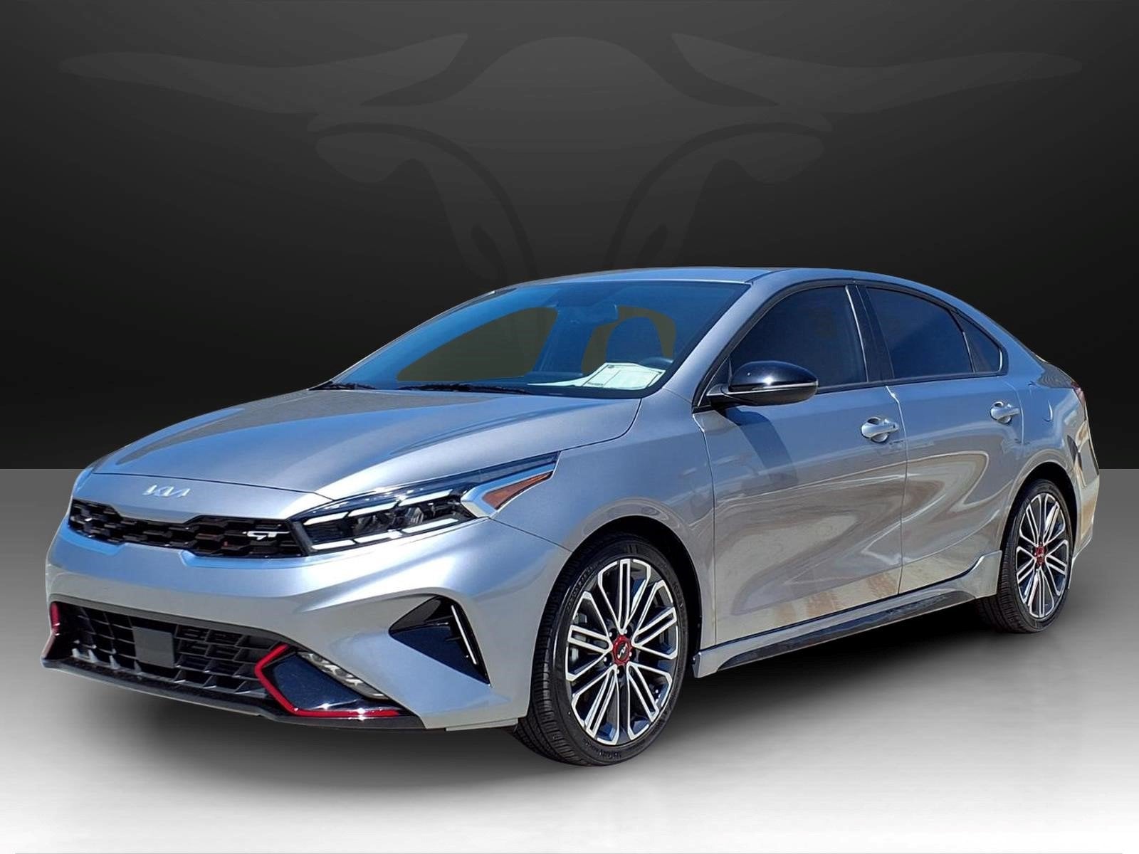 2024 Kia Forte GT in Steel Gray — front three-quarter view