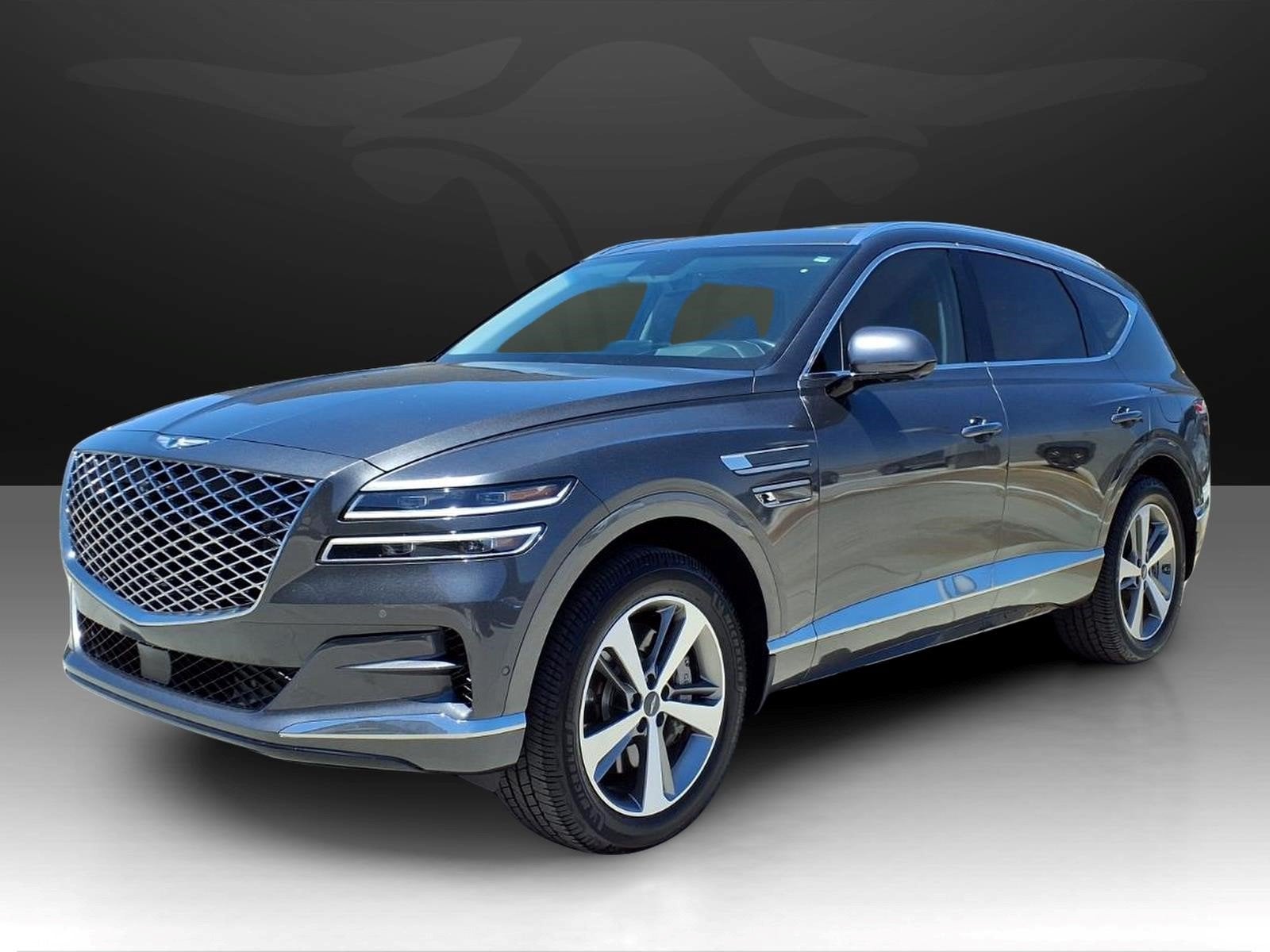 2023 Genesis GV80 3.5T AWD in Himalayan Gray — front three-quarter view