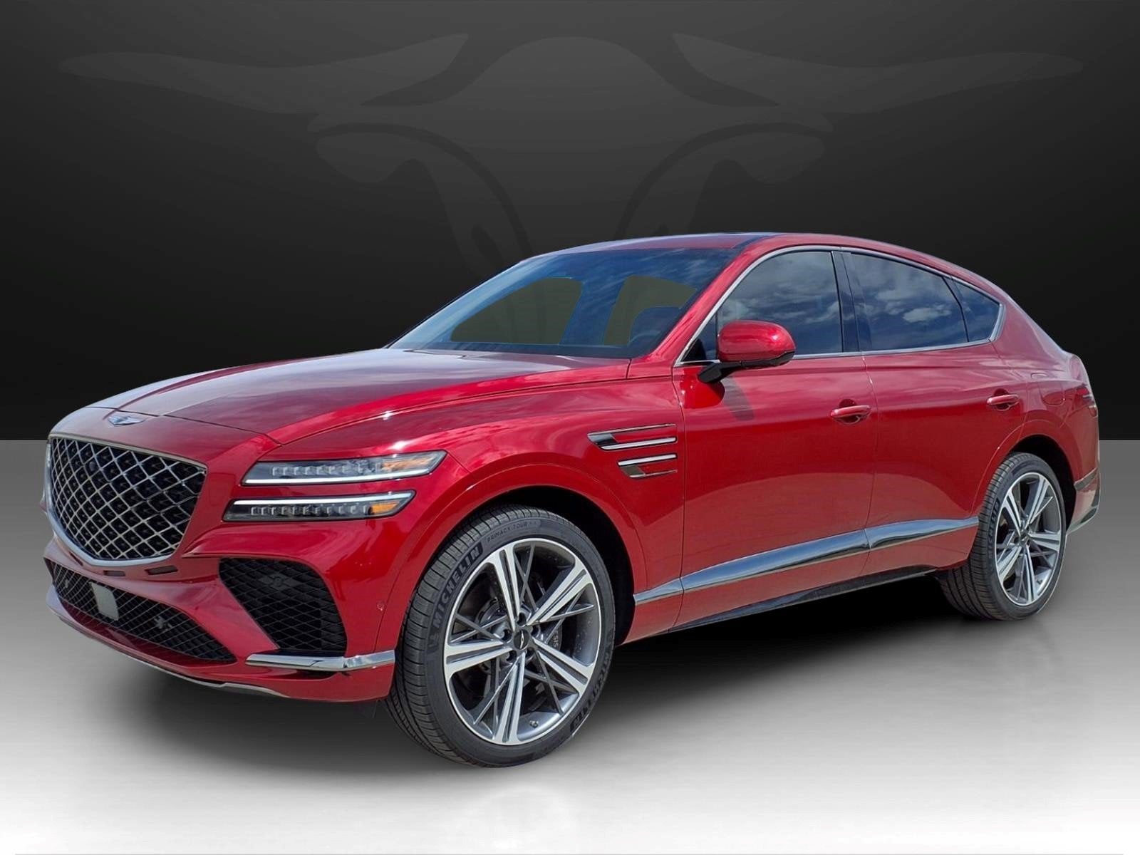 2026 Genesis GV80 Coupe 3.5T e-SC in Mauna Red — front three-quarter view
